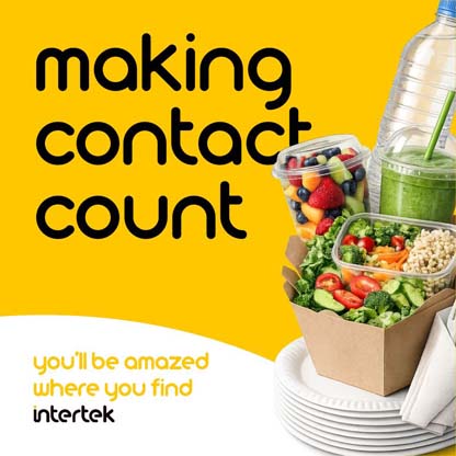 Packaged food sitting on a stack of paper plates