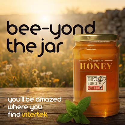 A jar of honey with a True Source certification label